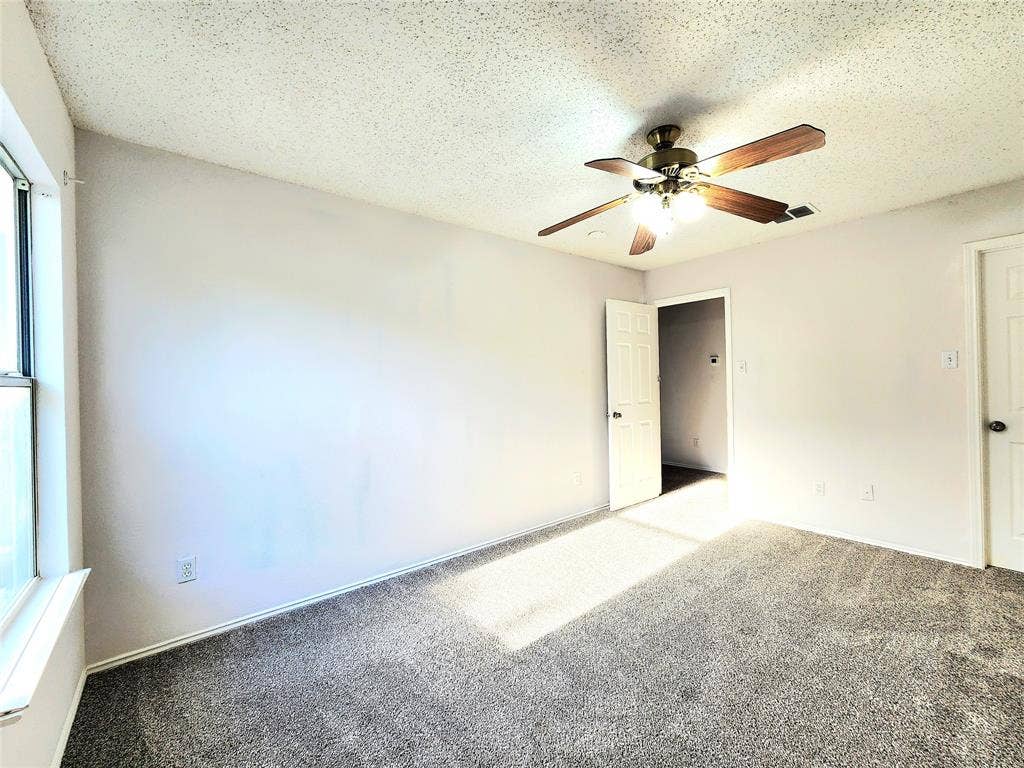 3625 Mason Drive, Plano, TX 75025 Wall-to-wall carpeting and a ceiling fan with integrated lighting
