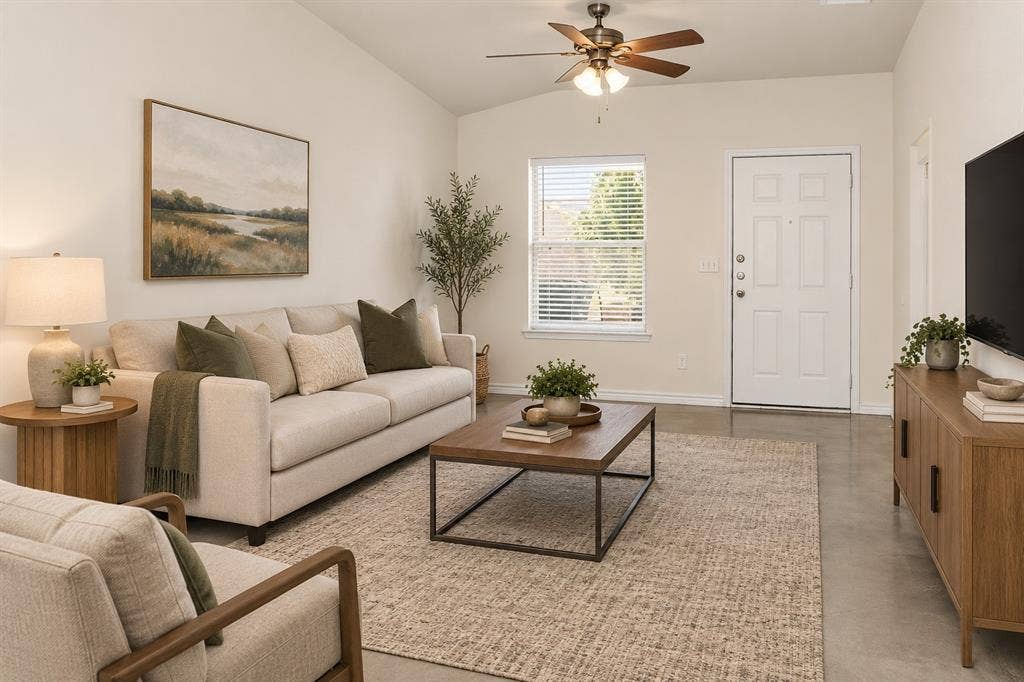 6015 Amelia Earhart Boulevard, #B, Killeen, TX 76543 Vaulted ceilings, a ceiling fan with light fixture, window with blinds, and durable concrete flooring