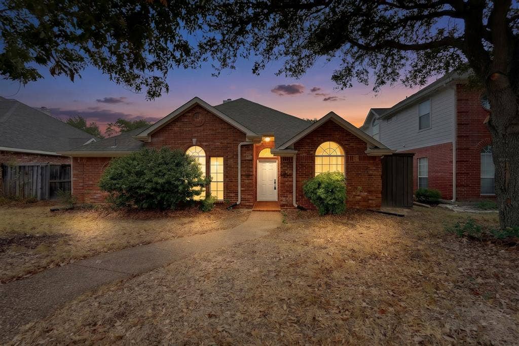 8108 Case Drive, Plano, TX 75025 Brick exterior with a gabled roofline