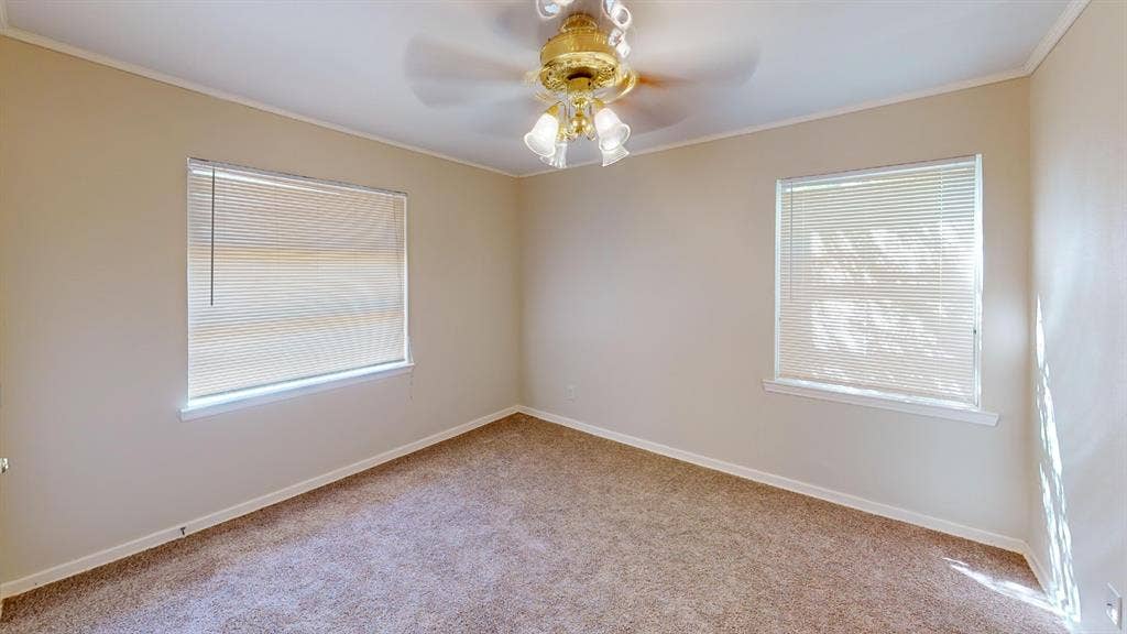 Neutral-toned walls complement carpeted flooring