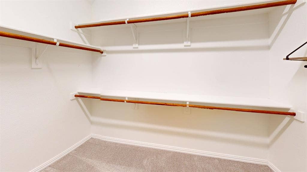 3285 Dover Drive, McKinney, TX 75069 Built-in shelving and closet rods provide organized storage