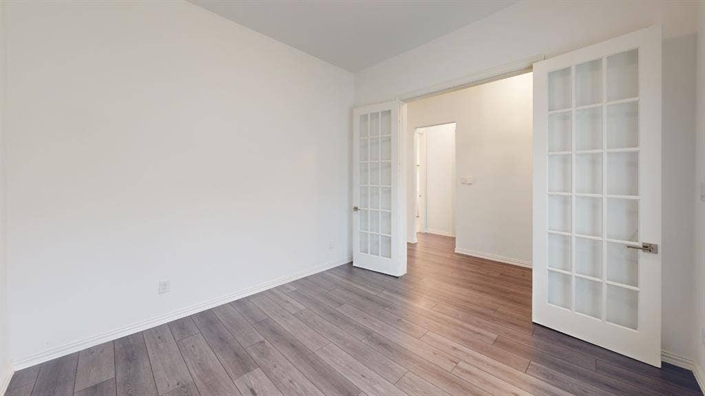 3285 Dover Drive, McKinney, TX 75069 Wood-finish flooring complemented by white walls