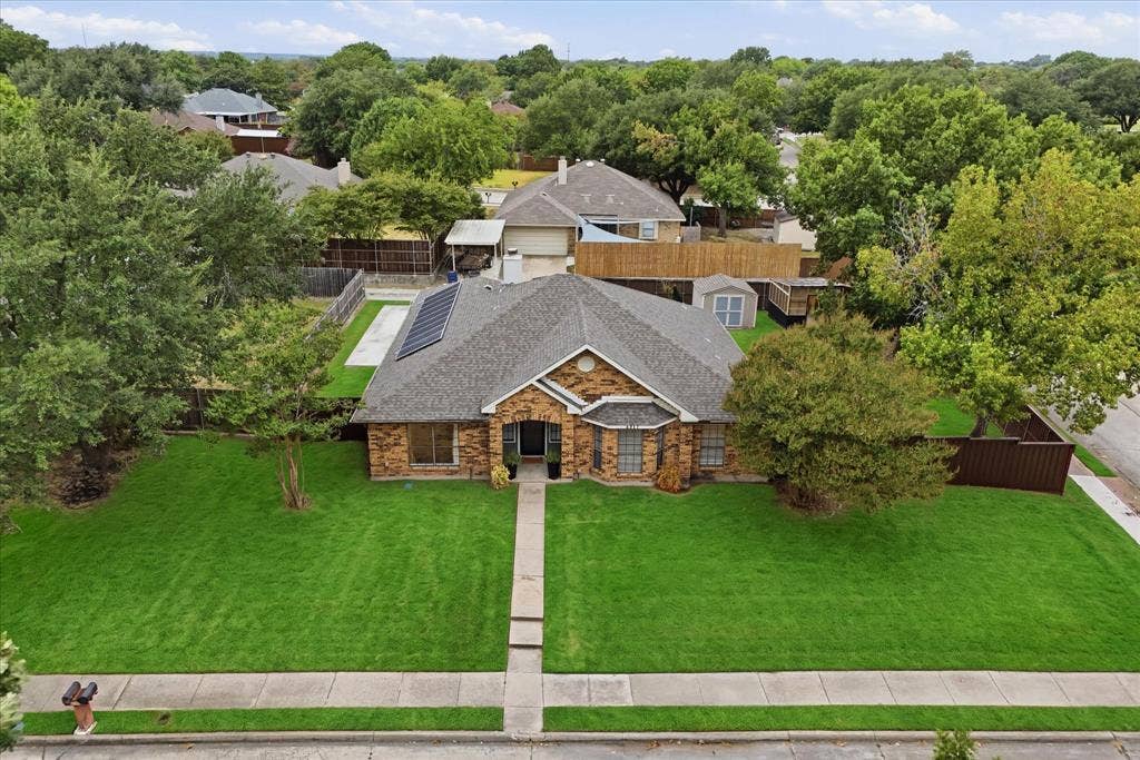 Welcome to 4917 Orchard Drive, a beautifully updated single-story home situated on an oversized corner lot with mature trees.