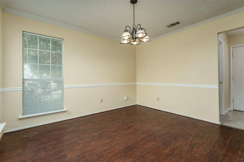 4500 Fargo Drive, Grand Prairie, TX 75052 Dark wood-finish flooring with light wall paint and white trim molding