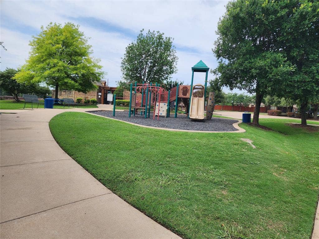 729 Watson Way, Crowley, TX 76036 View of play area featuring a lawn