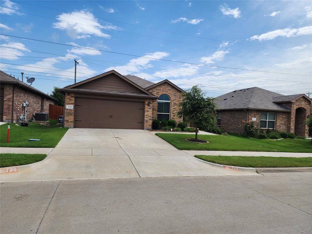 729 Watson Way, Crowley, TX 76036 Ranch-style house with a front yard, a garage, and central AC unit