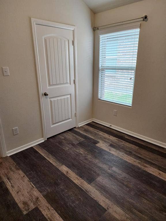 729 Watson Way, Crowley, TX 76036 Unfurnished room with dark wood-type flooring