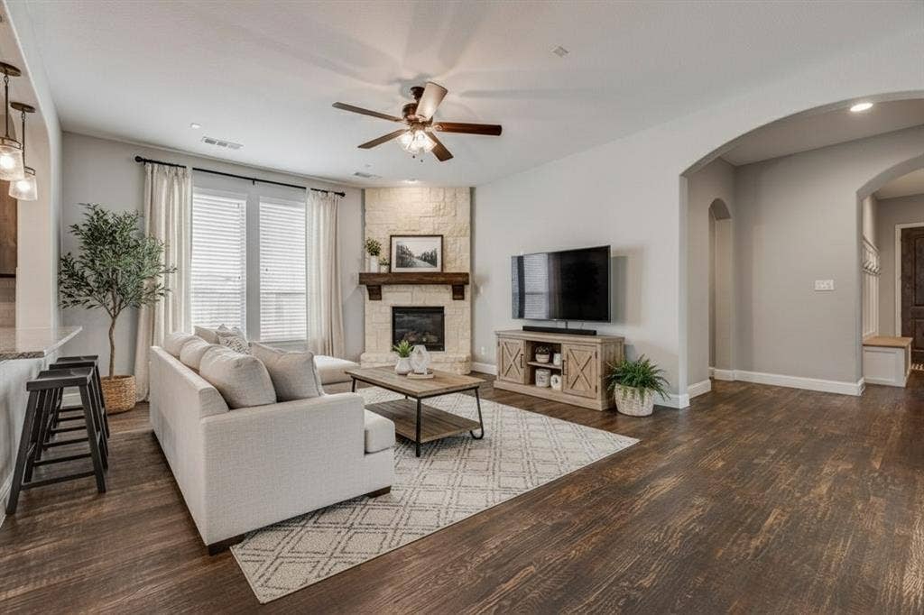 7421 San Jacinto Trail, McKinney, TX 75071 The living room has been virtually staged to showcase potential décor and layout options.