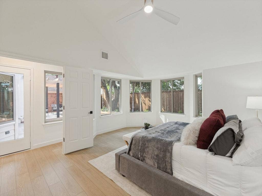 6029 Buffridge Trail, Dallas, TX 75252 Downstairs primary bedroom suite has vaulted ceilings