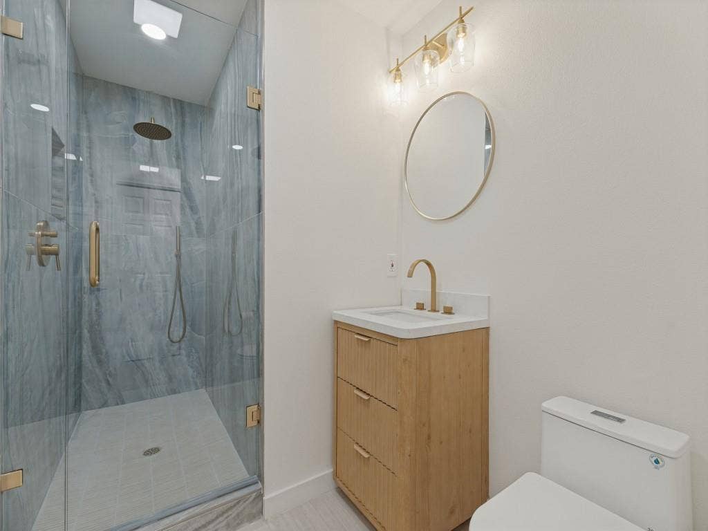 6029 Buffridge Trail, Dallas, TX 75252 Downstairs full bath with gorgeous extra deep shower
