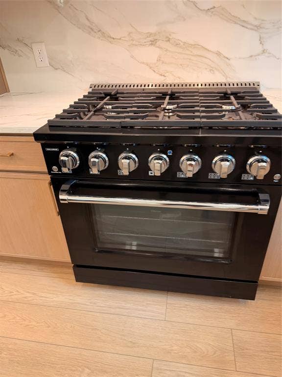6029 Buffridge Trail, Dallas, TX 75252 No expense spared with this Hallman 36" range