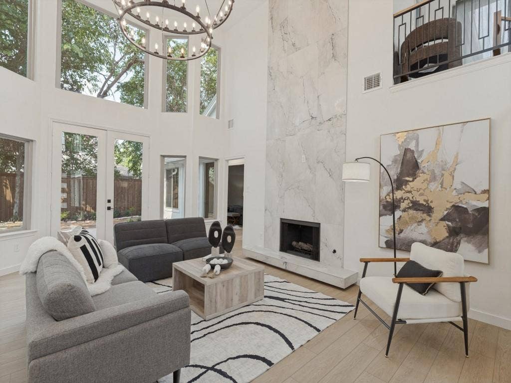 6029 Buffridge Trail, Dallas, TX 75252 Gorgeous fireplace with 25' surround, wired for tv or lighting over your favorite art piece.