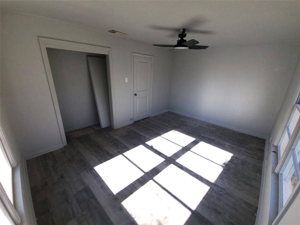 519 Dearborn Street, Waco, TX 76704 bedroom #4 featuring dark wood-style floors, a ceiling fan, and a closet