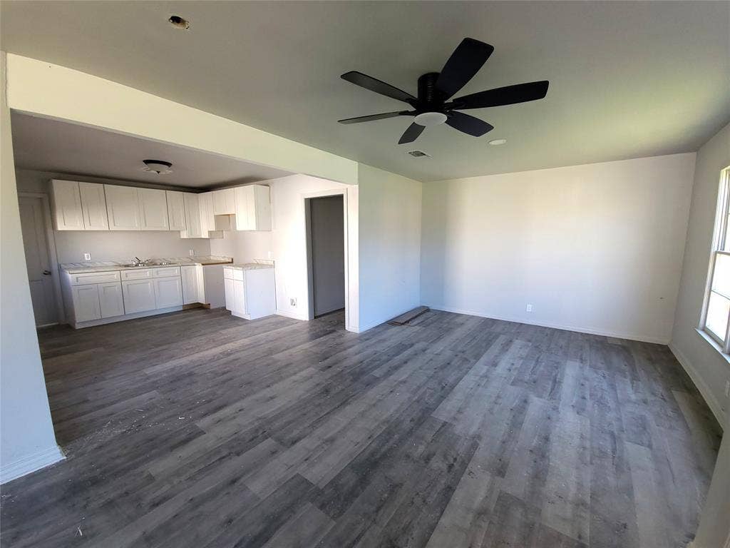 519 Dearborn Street, Waco, TX 76704 living room / Dining room Combo with ceiling fan and dark wood finished floors