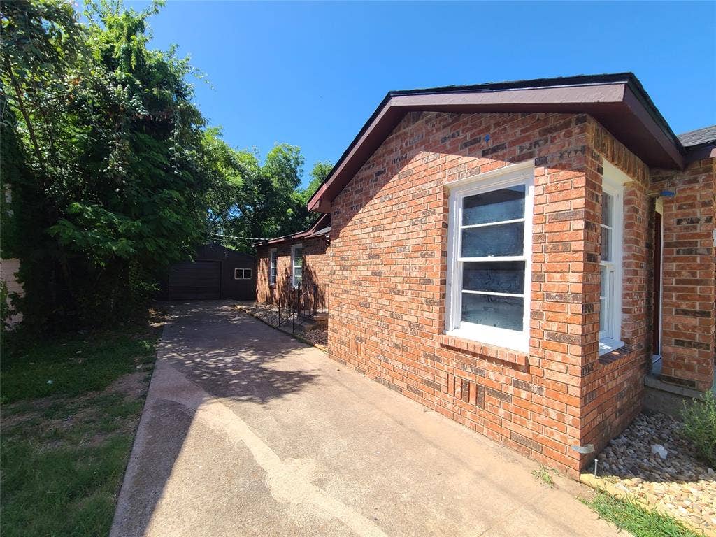 519 Dearborn Street, Waco, TX 76704 Nice Long Driveway for plenty of cars! Detached 1 car garage with storage area.