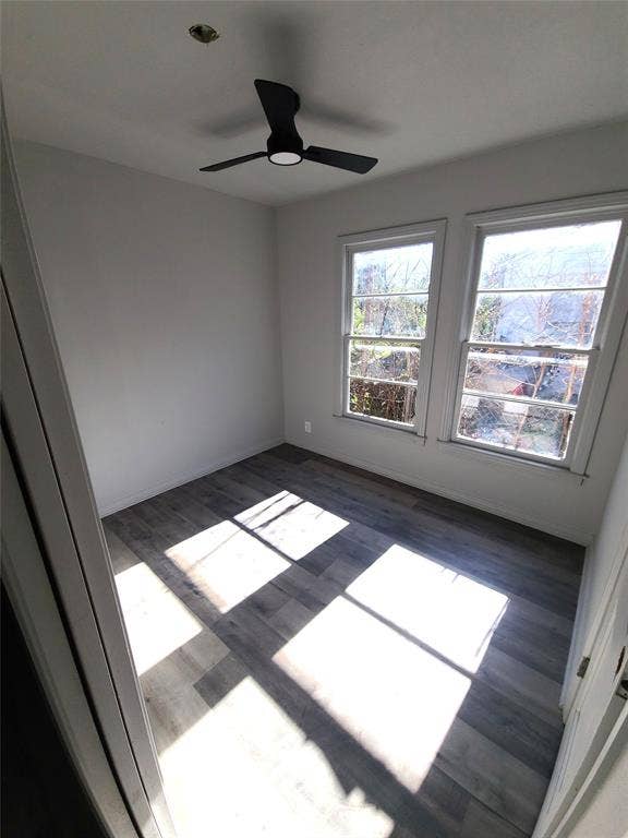 519 Dearborn Street, Waco, TX 76704 Bedroom #3 featuring ceiling fan and dark wood-style flooring
