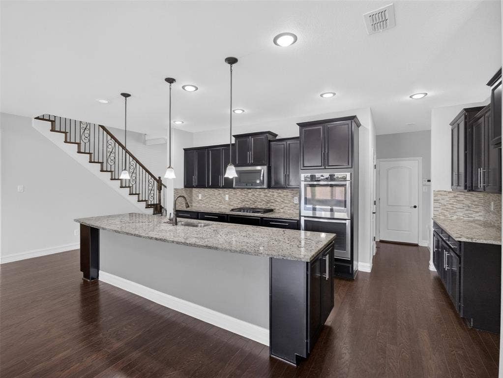8125 Charford Drive, Fort Worth, TX 76131 KITCHEN WITH DOUBLE OVEN