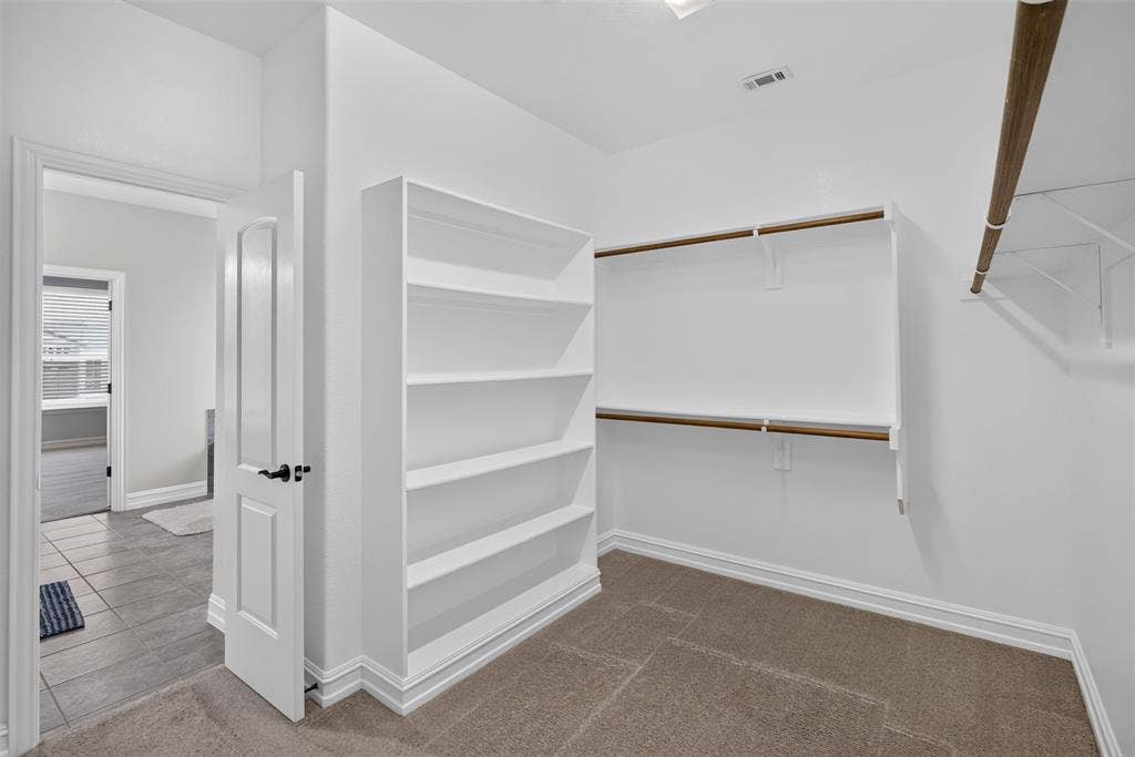 8125 Charford Drive, Fort Worth, TX 76131 PRIMARY BEDROOM WALK-IN CLOSET
