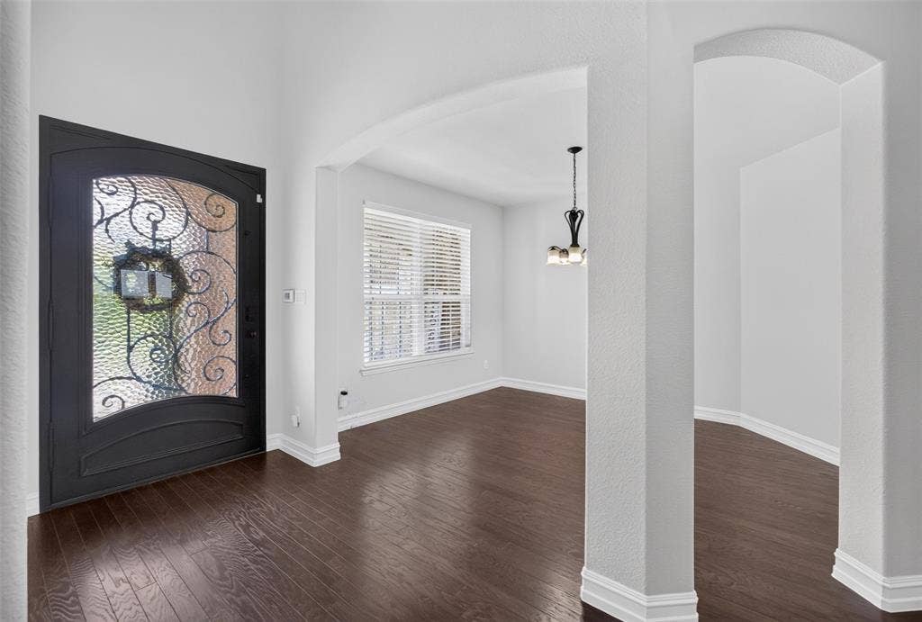 8125 Charford Drive, Fort Worth, TX 76131 FRONT ENTRY WITH WROUGHT IRON FRONT DOOR