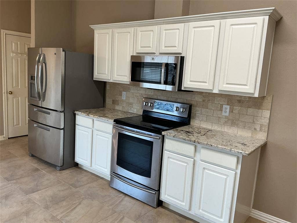 4005 Desert Mountain Drive, Plano, TX 75093 stainless steal fridge with 4 doors