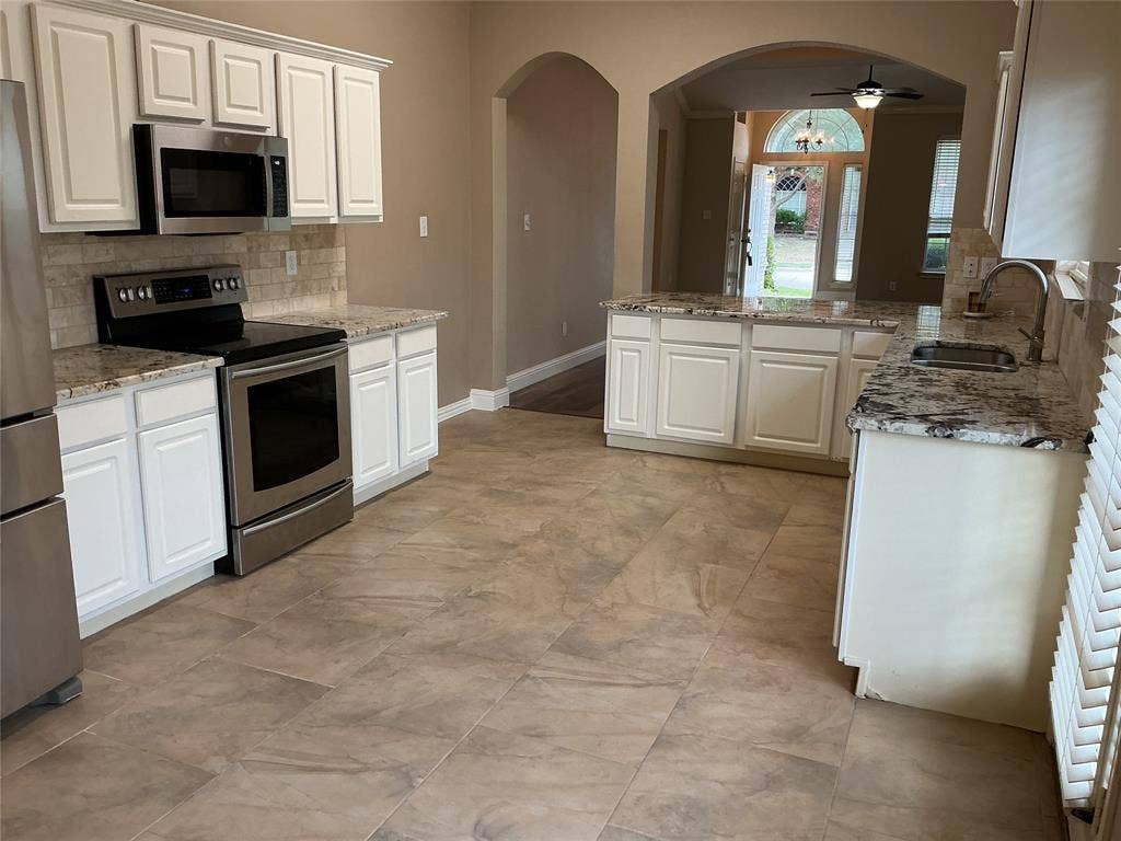 4005 Desert Mountain Drive, Plano, TX 75093 open kitchen with state of art granite