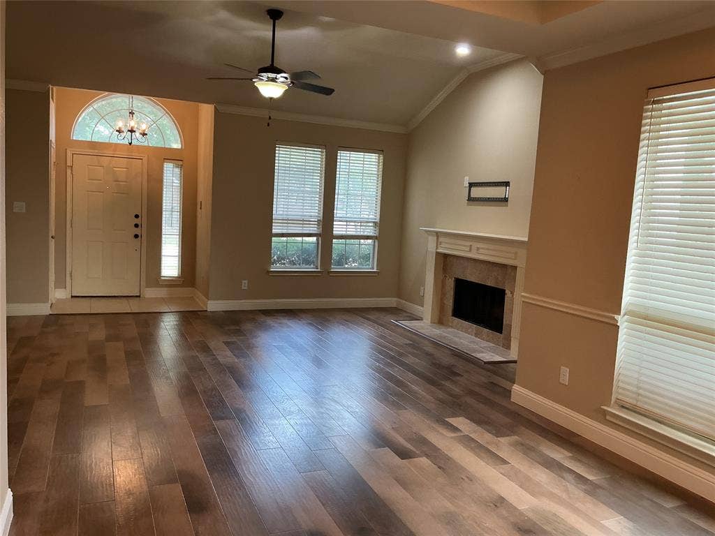 4005 Desert Mountain Drive, Plano, TX 75093 living room with gas fireplace