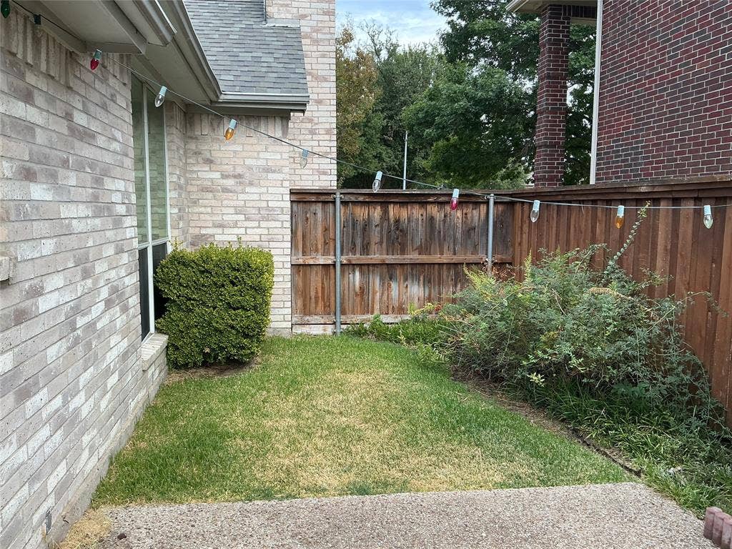 4005 Desert Mountain Drive, Plano, TX 75093 cozy yard with open patio