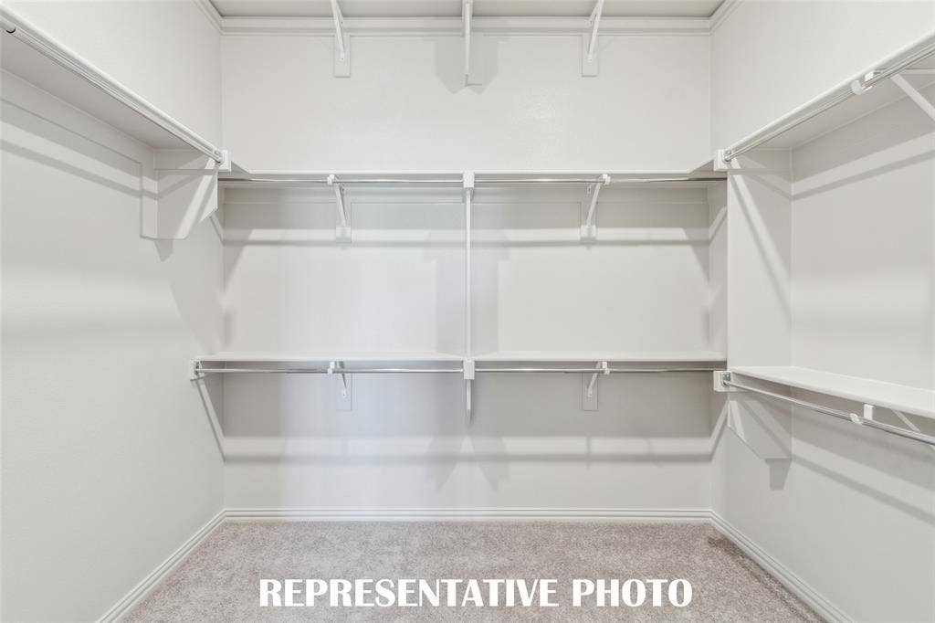1030 Splitrock Drive, Allen, TX 75013 A dream owner's closet with seasonal hanging space is the cherry on top in this dreamy owner's suite! REPRESENTATIVE PHOTO