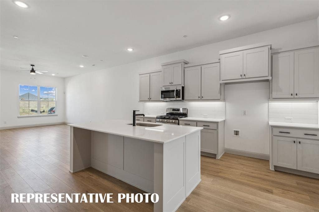 1030 Splitrock Drive, Allen, TX 75013 Your new kitchen features a spacious island perfect for a quick bite or homework station! REPRESENTATIVE PHOTO