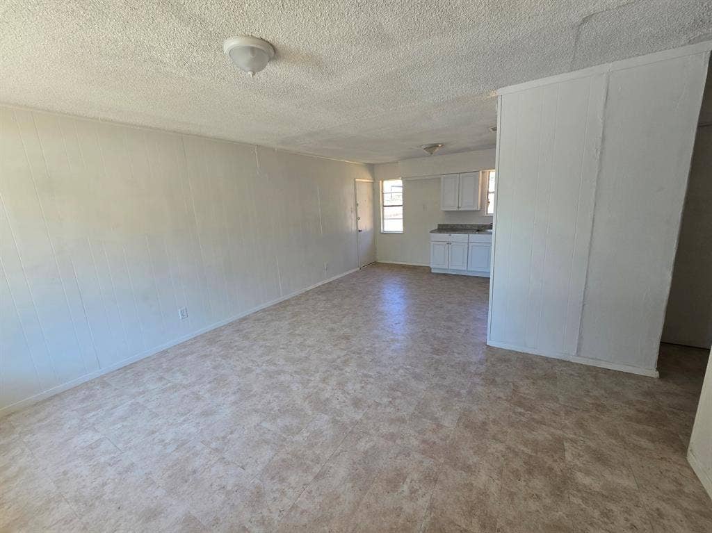 409 Monica Drive, Garland, TX 75041 Vinyl flooring in neutral tones