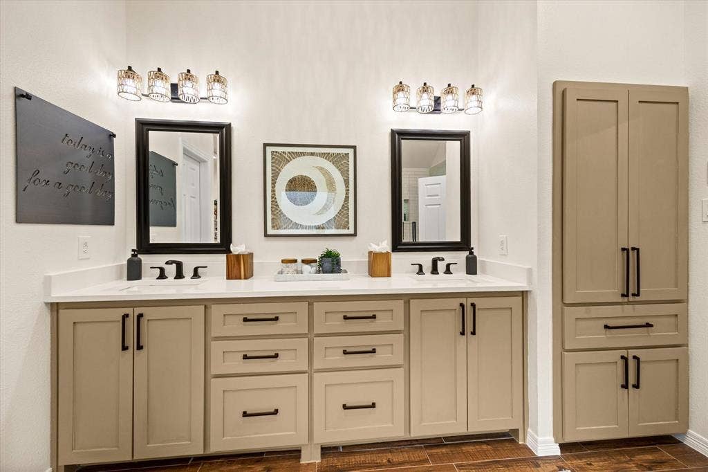 9604 Champions Drive, Granbury, TX 76049 Updated Primary Bathroom Featuring Custom Cabinets, Quartz Countertops, Kohler Fixtures, Framed Mirrors, Designer Hardware and Light Fixtures