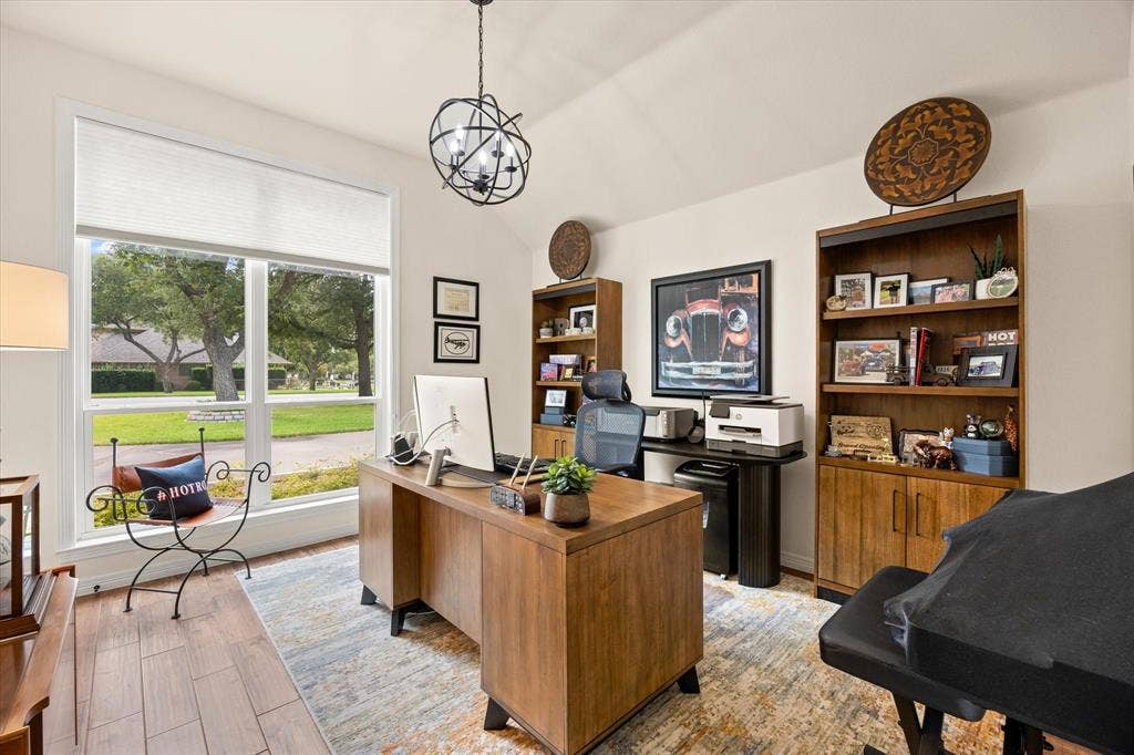 9604 Champions Drive, Granbury, TX 76049 4TH Bedroom with Elevated Ceiling Currently Used as an Office, Wall of Windows Overlooking Treed Front Yard and Walk-in Closet