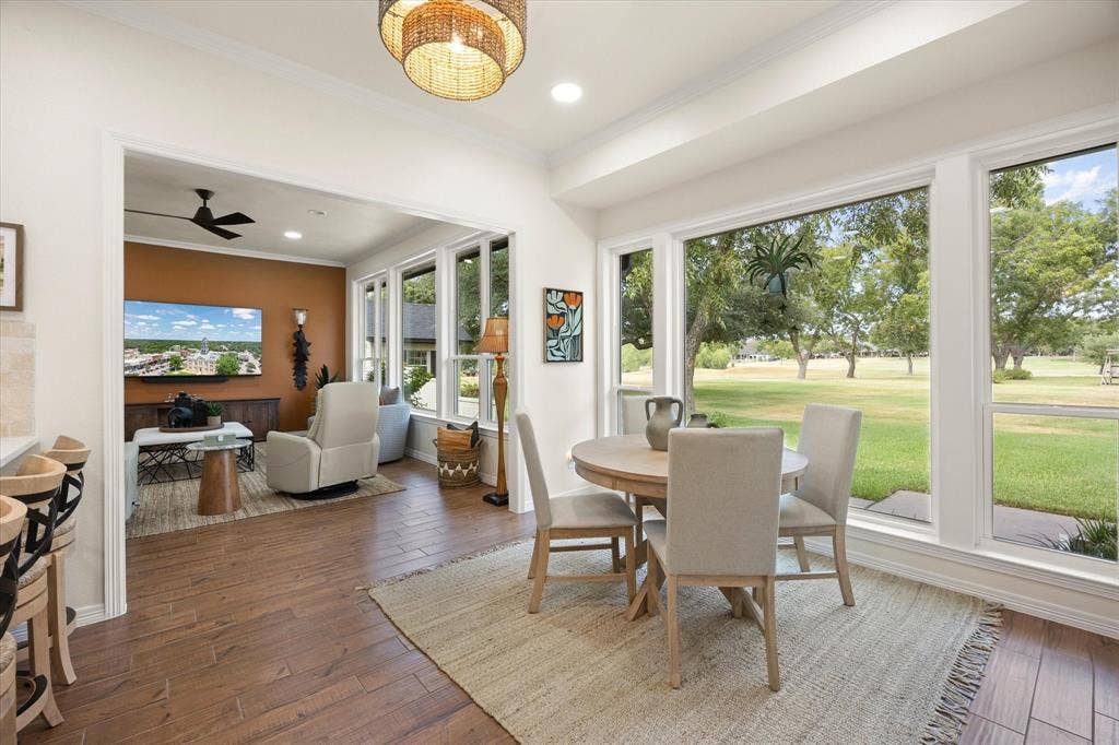 9604 Champions Drive, Granbury, TX 76049 Breakfast Room with Wall of Windows Overlooking Golf Course