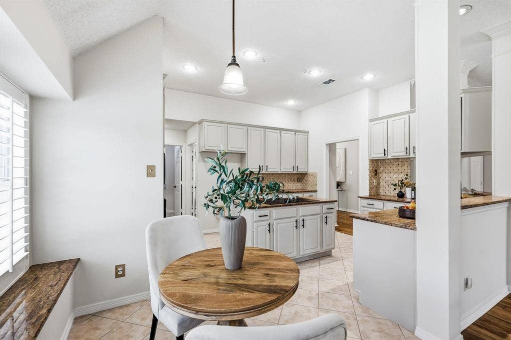 287 Tealwood Drive, Coppell, TX 75019 Warm & Inviting Island Kitchen