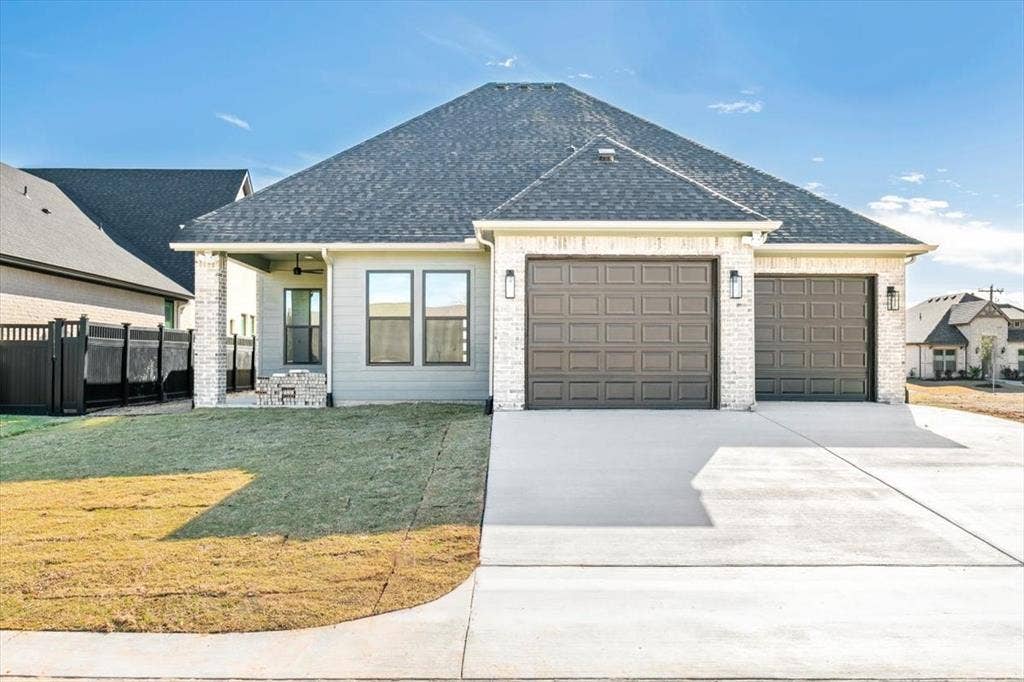 Rear view with garage entry; 10' garage doors