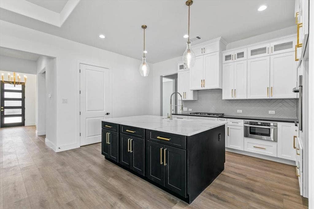 View of kitchen showing drawer microwave for safer food removal