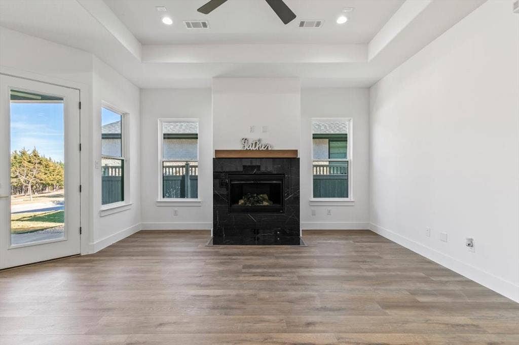 Elegant tile framed gas fireplace