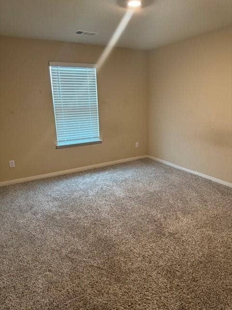 Recessed ceiling lighting, window with blinds, and carpeted flooring
