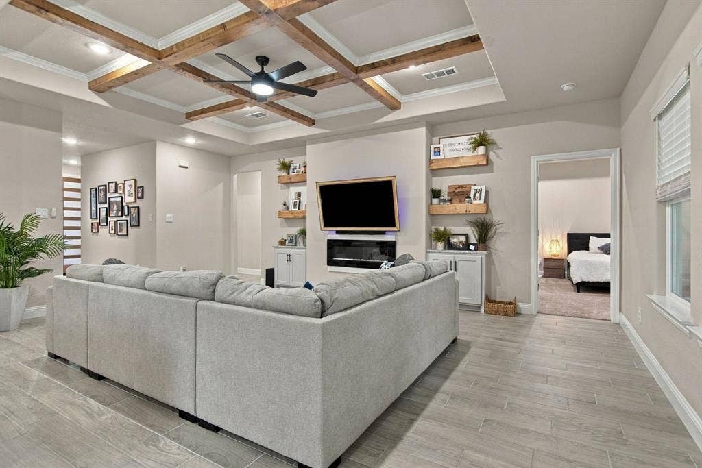 4822 Wichita Street, Granbury, TX 76048 Tray ceiling with wood-finish beams and recessed lighting