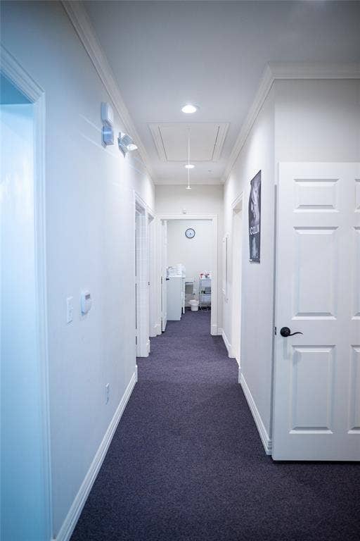 8668 John Hickman Parkway, #906, Frisco, TX 75034 Modern hallway featuring recessed ceiling lighting, clean white six-panel doors, neutral wall finishes, and dark carpet flooring throughout