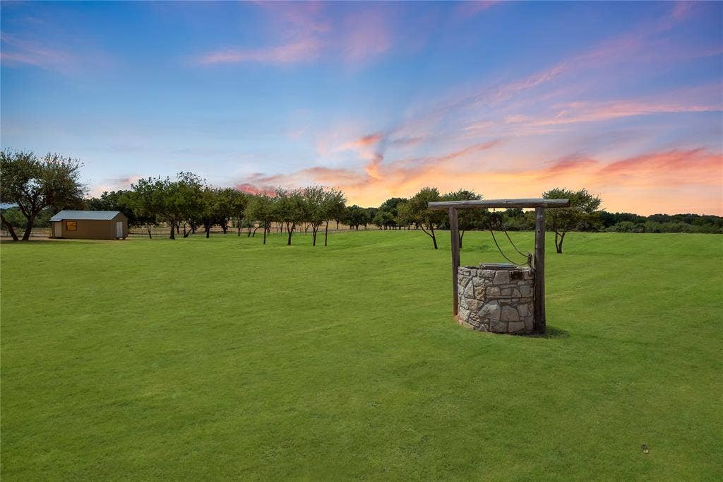 4870 Rhea Road, Granbury, TX 76049 Virtual twilight & grass greening enhancement