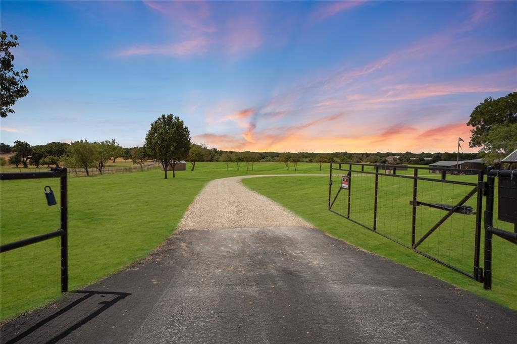 4870 Rhea Road, Granbury, TX 76049 Virtual twilight & grass greening enhancement