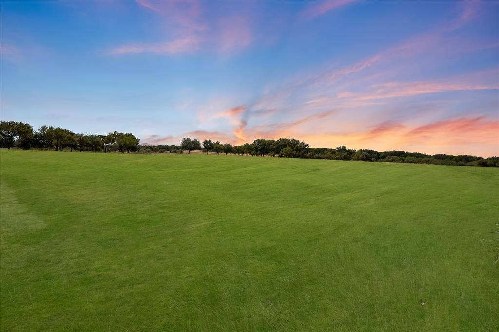 4870 Rhea Road, Granbury, TX 76049 Virtual twilight & grass greening enhancement