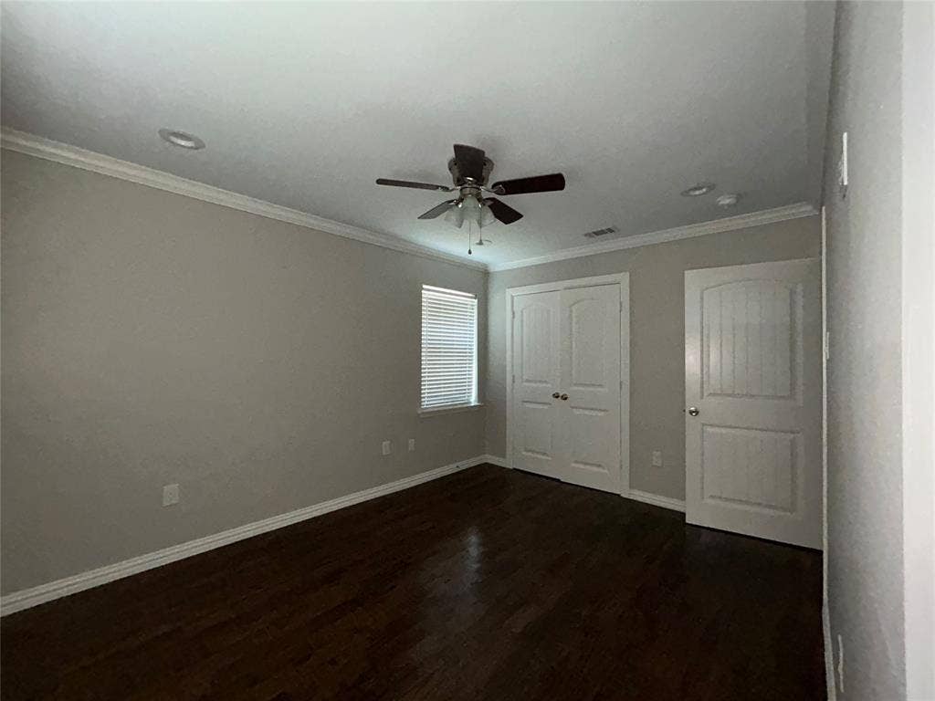 3602 Palm Drive, Mesquite, TX 75150 Dark wood-finish flooring, ceiling fan with integrated lighting, recessed lighting, white window blinds, and white trim throughout