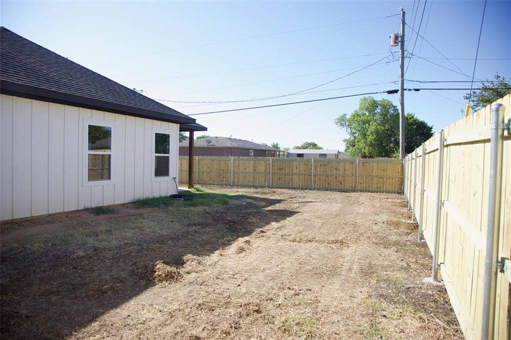 9432 PRAIRIEVIEW Drive, Crowley, TX 76134 Newly installed privacy fence enclosing the property