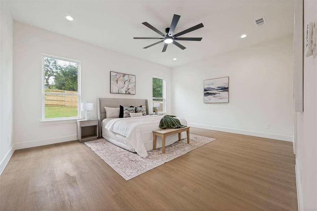 1511 Morrell Avenue, Dallas, TX 75203 Spacious room featuring wood-finish flooring, recessed lighting, and a contemporary ceiling fan