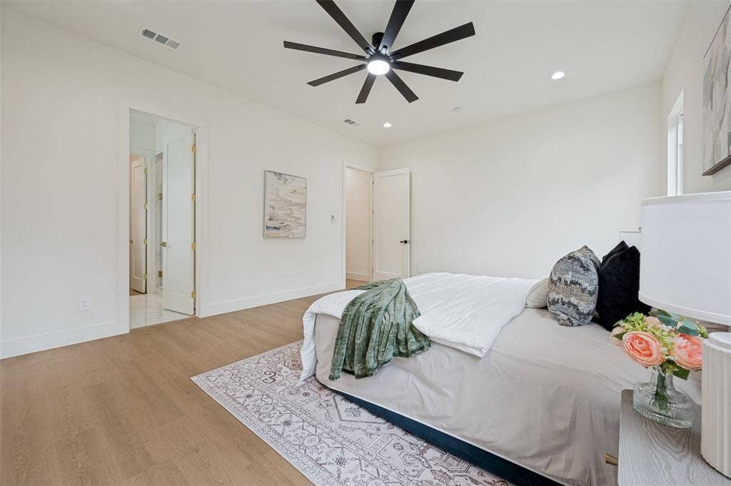 1511 Morrell Avenue, Dallas, TX 75203 Wood-finish flooring, recessed lighting, ceiling fan, and white walls