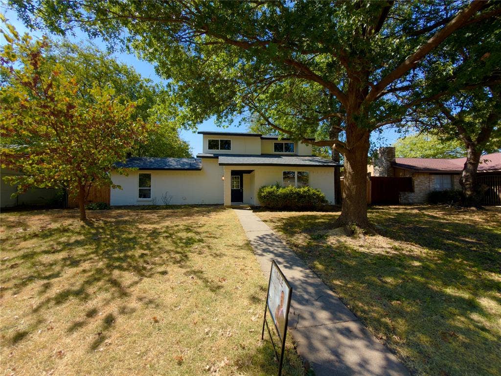 1834 Caldwell, Garland, TX 75041 Contemporary exterior with white siding and dark trim