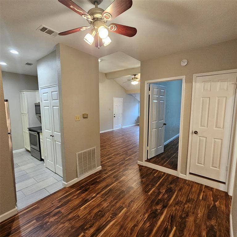9600 ROYAL, #612, Dallas, TX 75243 Empty room featuring wood finished floors and ceiling fan