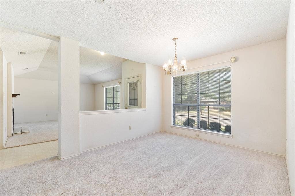 1002 Courtney Drive, Mesquite, TX 75150 Another niced sized room with a large window to enjoy the view. Door to kitchen is directly behind.